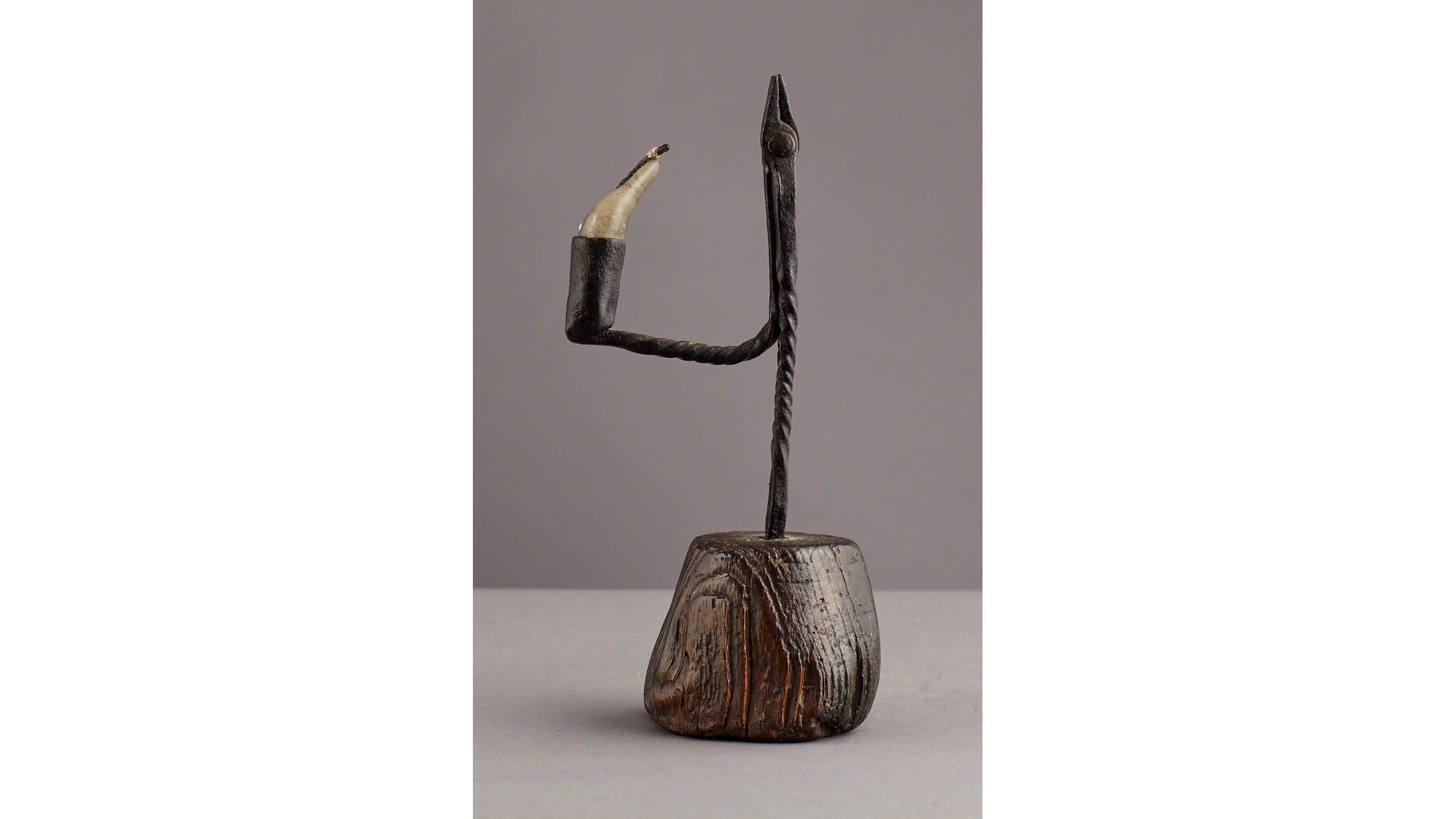Early 19th Century Twist Stem Wrought Iron and Elm Rushnip, English, circa 1800-1820